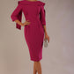 Model wearing the Rio statement collar pencil dress in festive fuchsia, showcasing its architectural silhouette (Festive Fuchsia)