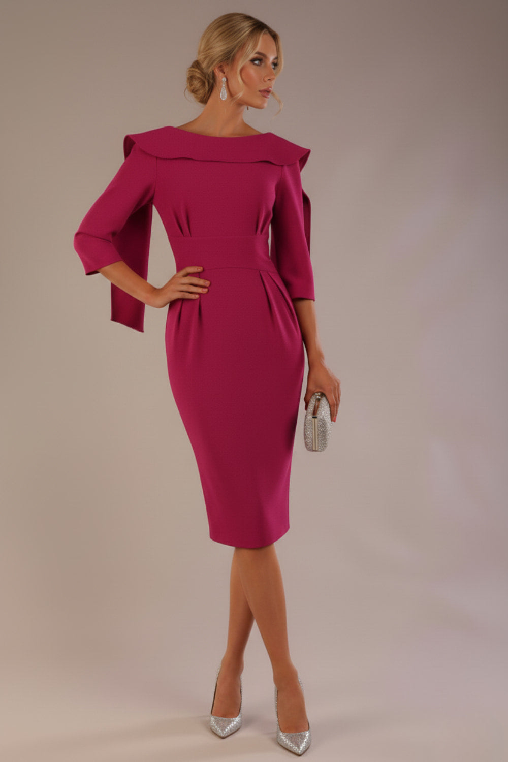 Model wearing the Rio statement collar pencil dress in festive fuchsia, showcasing its architectural silhouette (Festive Fuchsia)