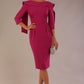 Model wearing the Rio statement collar pencil dress in festive fuchsia, showcasing its architectural silhouette.