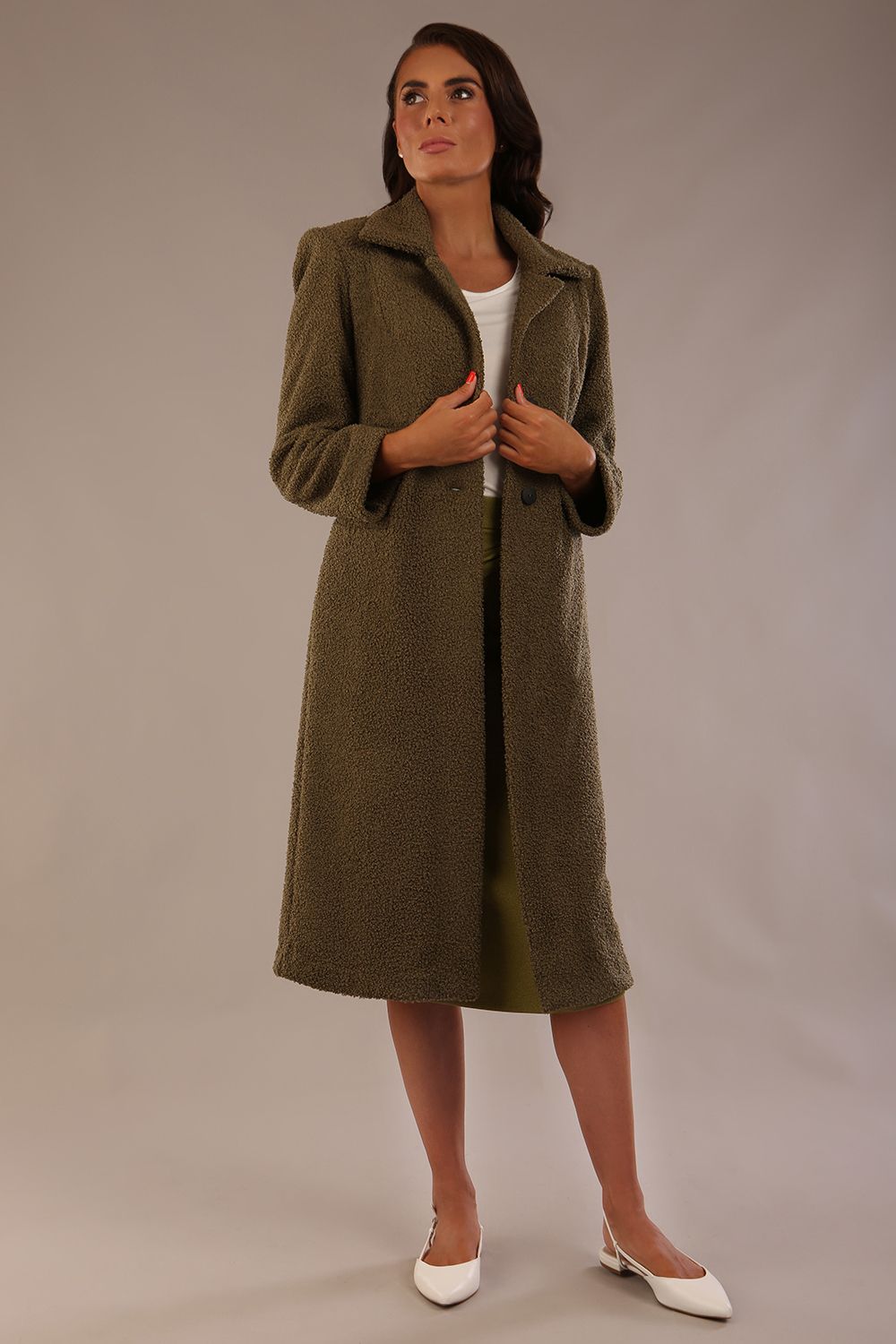 Side view of the Ambrose coat with the elegant collar turned up for extra warmth and style.