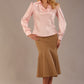 Blonde Model wearing the Shropshire top in pink, styled with a camel flared fishtail skirt