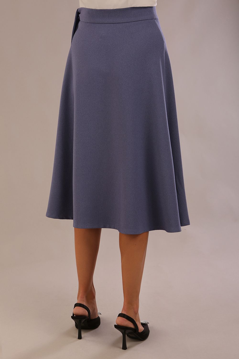 Back view of the Harlow A-line midi skirt in blue mineral, showing its fluid drape and clean silhouette