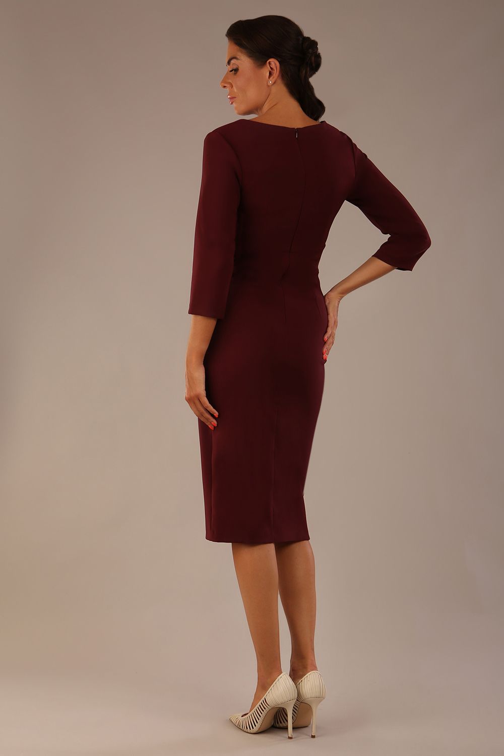 Back view of the Adley pencil dress in burgundy red, showing the clean lines and tailored fit