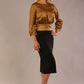 Model wearing a Hollywood lustre gold top with a blouson silhouette and a black pencil skirt front side