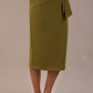 Model wearing an Oasis Green Hedy pencil skirt with a draped front 