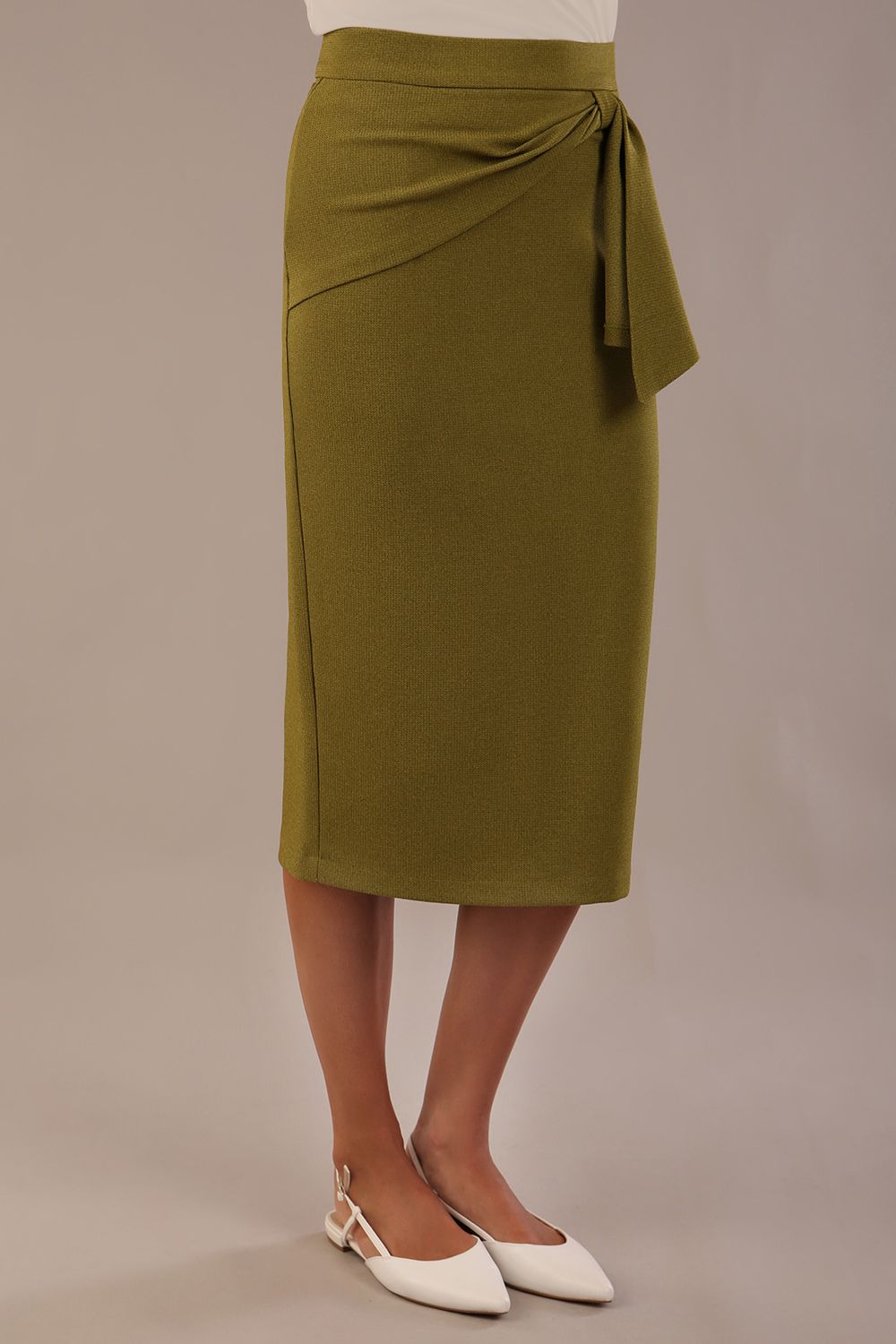 Model wearing an Oasis Green Hedy pencil skirt with a draped front 