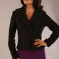 Model wearing the Teddy Luxe Boucle Jacket in black, showcasing its elegant shawl collar and textured fabric.