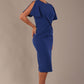 Model wearing nautical blue Finley midi pencil dress with ruched waist and split sleeves, side front view.