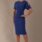 Model wearing nautical blue Finley midi pencil dress with ruched waist and split sleeves, front view.
