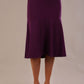 Model wearing a purple Marlene fishtail skirt, highlighting the silhouette.