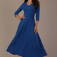 Woman wearing a blue dress against a plain background (Imperial Blue)