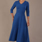  Model wearing the Nova V-neck A-line midaxi dress in vibrant imperial blue