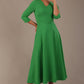  Model wearing the Nova V-neck A-line midaxi dress in vibrant jelly bean green