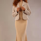 Model wearing the Teddy Luxe Boucle Jacket in pink tint, styled over a cream pencil dress close up (Pink Tint)