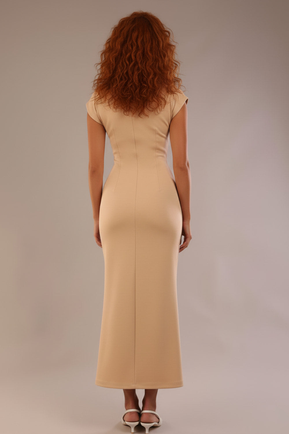 Model wearing the Kaden high neck midaxi dress in cafe au lait cream, showing the sleek silhouette and cap sleeves. against a plain background (Cafe au Lait Cream)