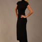 Model wearing the Kaden high neck midaxi dress in jet black, showing the sleek silhouette and cap sleeves. against a plain background