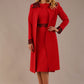 Model wearing the Haven lace trim midi coat in salsa red, styled with the matching Lovell dress.