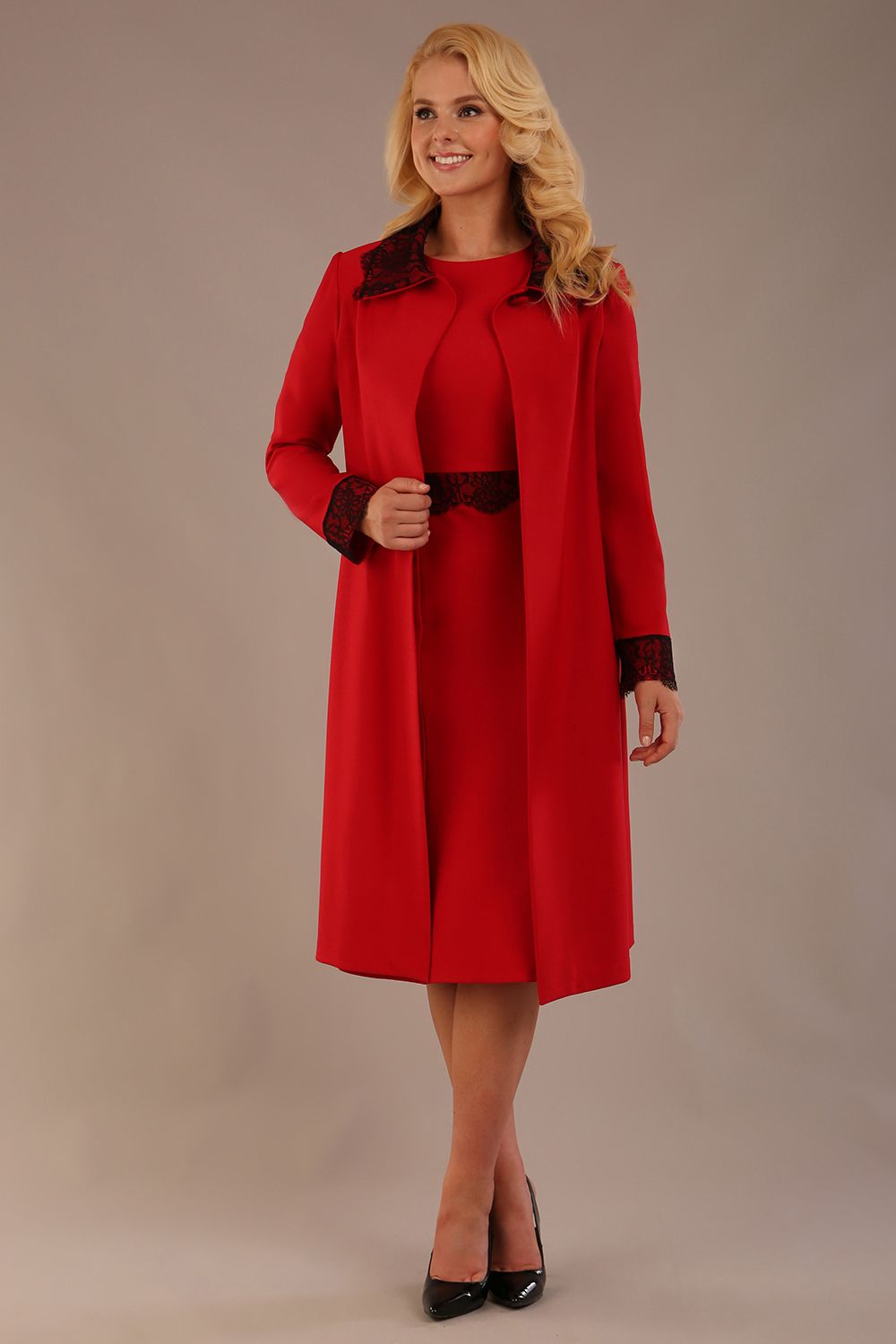 Model wearing the Haven lace trim midi coat in salsa red, styled with the matching Lovell dress.