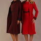 Two models wearing matching a diva catwalk outfits with a port royale and salsa red colour scheme on a plain background.