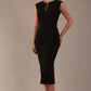 Model wearing the Wesley notched pencil dress in black, showcasing the sculpted silhouette and V-notch neckline