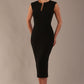 Model wearing the Wesley notched pencil dress in black, showcasing the sculpted silhouette and V-notch neckline
