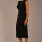Model wearing the Wesley notched pencil dress in black, showcasing the sculpted silhouette and V-notch neckline.
