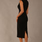 Model wearing the Wesley notched pencil dress in black, showcasing the sculpted silhouette and V-notch neckline back view