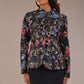 Model wearing the Keanu high-neck floral jacquard jacket styled with a navy pencil skirt (Nightshade Bloom)