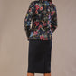 Back image of model wearing a classic Ingrid pencil skirt in dark navy blue with a sophisticated jacket