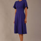 Model wearing a diva catwalk Anders petal sleeve A-line dress against a plain background (Spectrum Indigo)