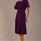 Model wearing a diva catwalk Anders petal sleeve A-line dress against a plain background (Purple)
