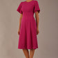 Model wearing a diva catwalk Anders petal sleeve A-line dress against a plain background (Magenta)