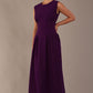 Side view of the Cleo midaxi dress, highlighting the flattering silhouette and pleated skirt.