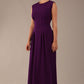 Side view of the Cleo midaxi dress, highlighting the flattering silhouette and pleated skirt.