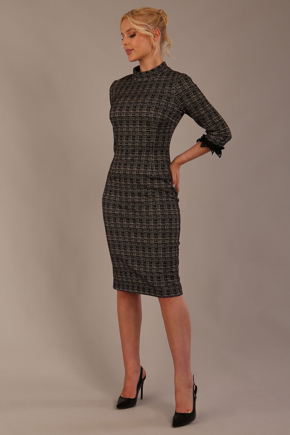 Model wearing the Sterling Cooper lace cuff tweed pencil dress