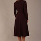 Back view of the Moneypenny long-sleeved A-line dress, showing the clean silhouette.