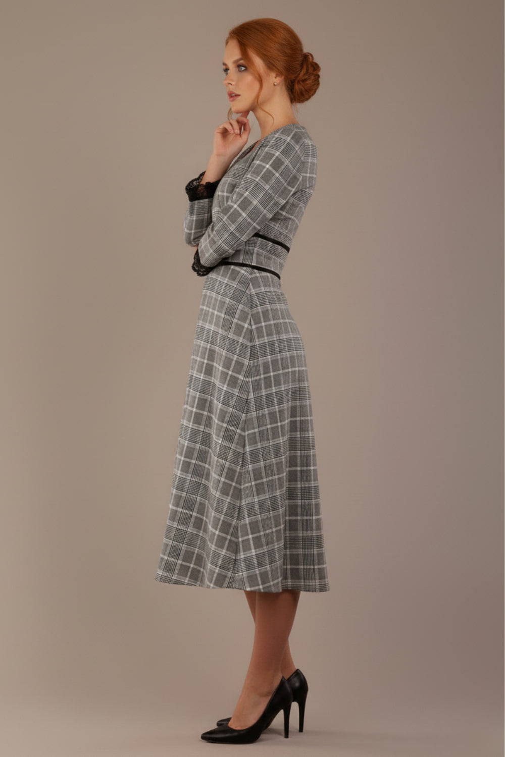 Model wearing the Hendricks check midi dress in misty grey with black lace cuffs and a V-neck (Misty Grey Check)