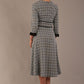 Back view of the Hendricks check midi dress, showing the defined waistbands and A-line skirt.