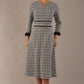 Model wearing the Hendricks check midi dress in misty grey with black lace cuffs and a V-neck (Misty Grey Check)