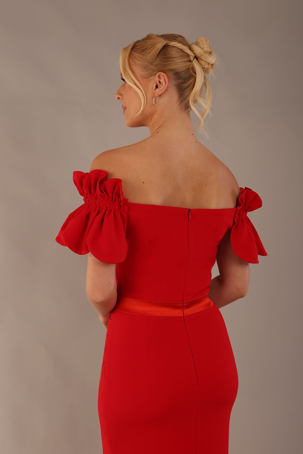 Close-up back view of the Harmony Bardot dress bodice, showing the zip and contrast waistband detail. (Passion Red & Fire Orange Satin)