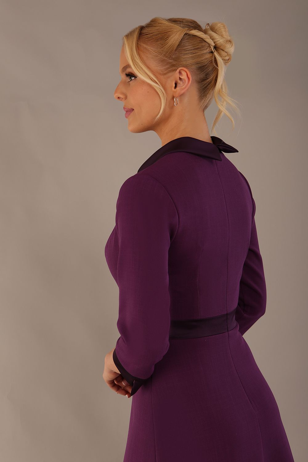 Side view of the Sybil satin contrast dress, highlighting the A-line skirt and 3/4 satin-cuffed sleeves. (Imperial Purple)