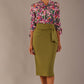 Model wearing a Radley Floral Tango print top with a central tie neckline and 3/4 sleeves, styled with an olive green skirt.