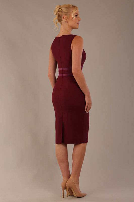 Back view of the Rialto pencil dress in burgundy, highlighting the tailored fit.