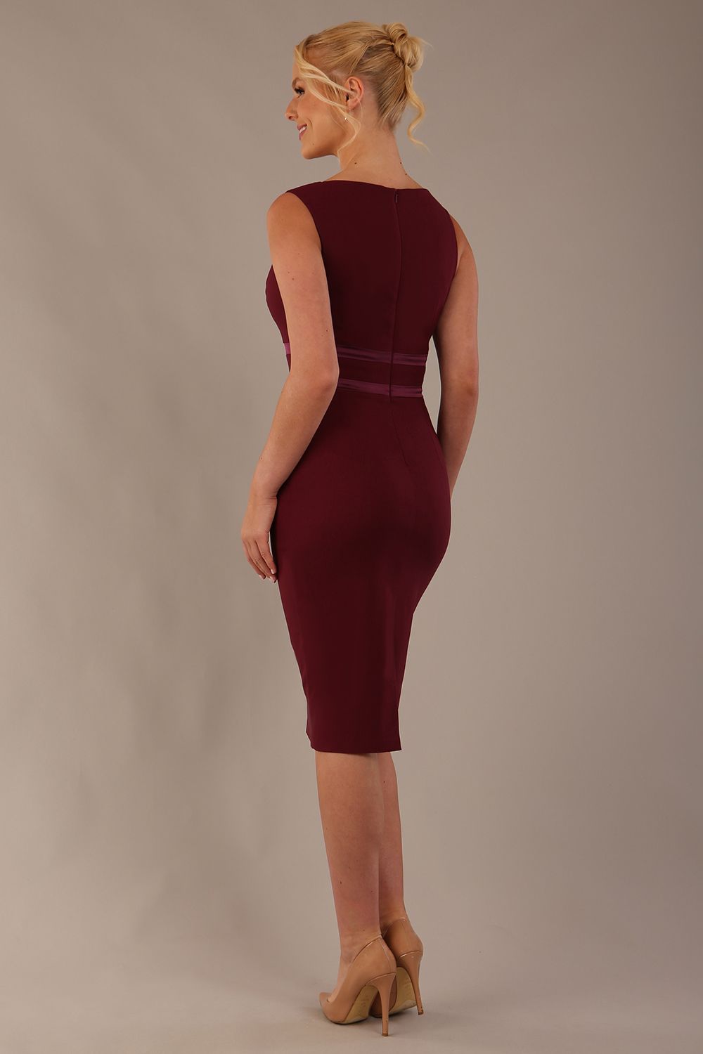 Back view of the Rialto pencil dress in burgundy, highlighting the tailored fit.