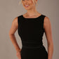 Close-up of the contrast satin waistband on the black Rialto dress.
