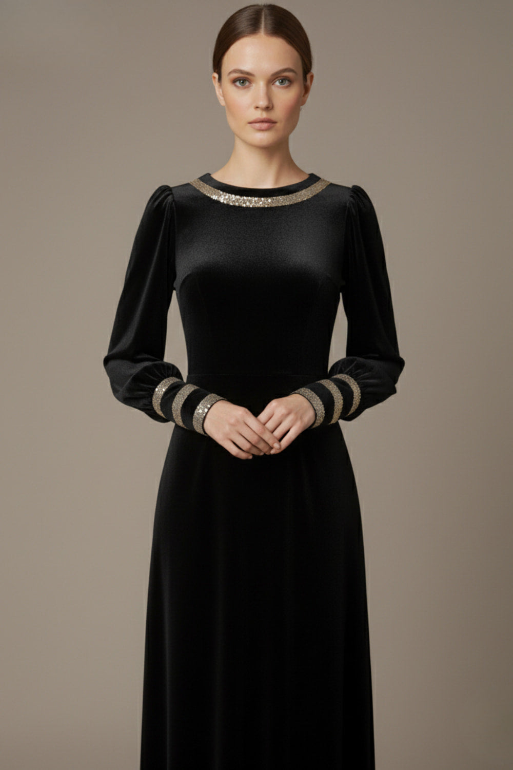 Model wearing the diva catwalk Spinetti long-sleeved jewelled velvet midi dress in black front close up
