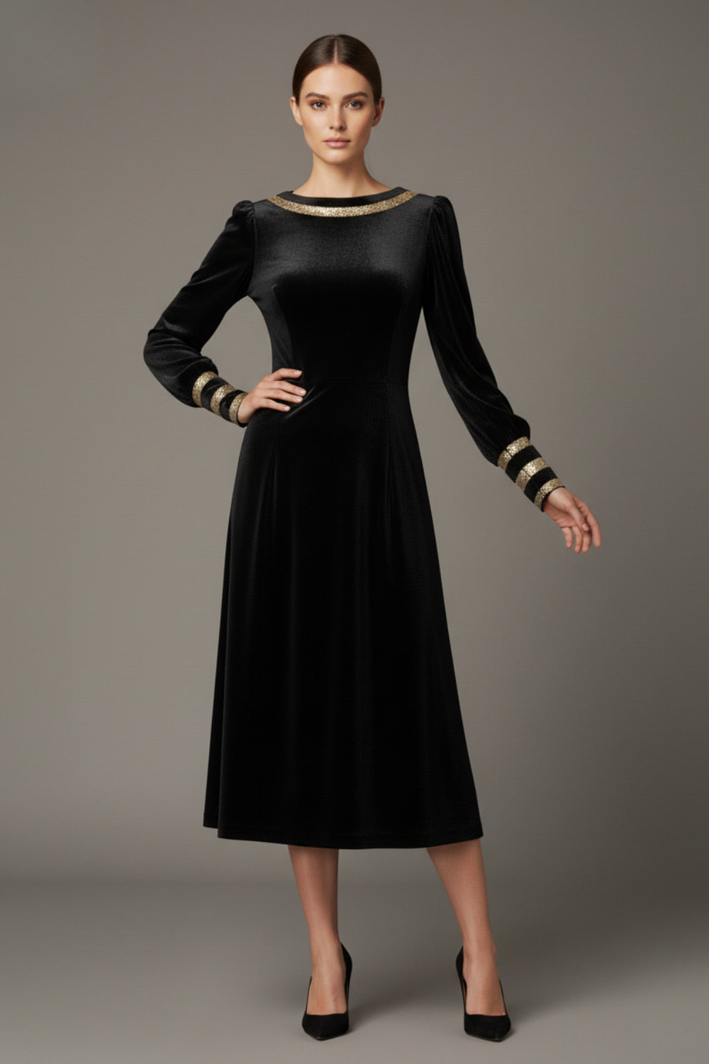 Model wearing the diva catwalk Spinetti long-sleeved jewelled velvet midi dress in black.