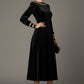 Model wearing the diva catwalk Spinetti long-sleeved jewelled velvet midi dress in black.