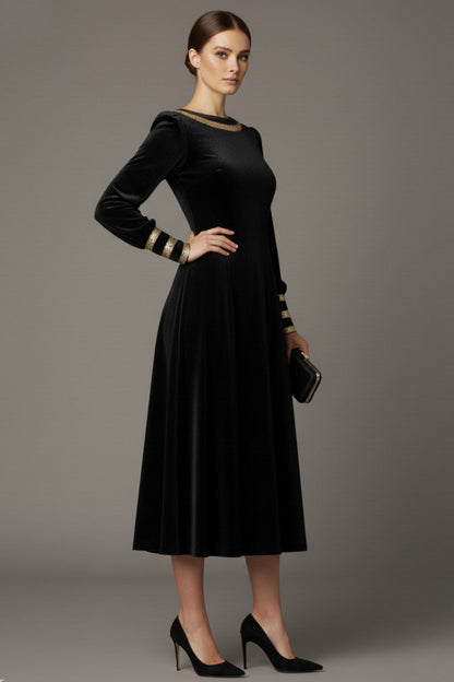 Model wearing the diva catwalk Spinetti long-sleeved jewelled velvet midi dress in black (Black Velvet with Sherwood Glitter Contrast)