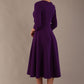 Back view of the Perpetua A-line midi dress in deep purple (Deep Purple)